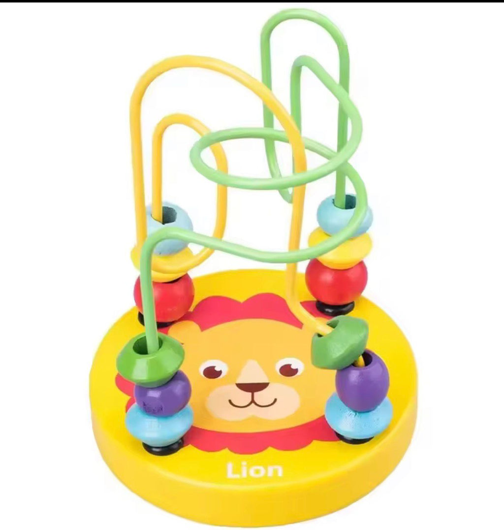 Colorful lion-themed baby toy with beads and loops on a white background